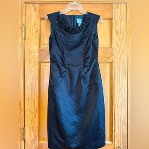 Black sleeveless cocktail dress (Size 6) with bead detail